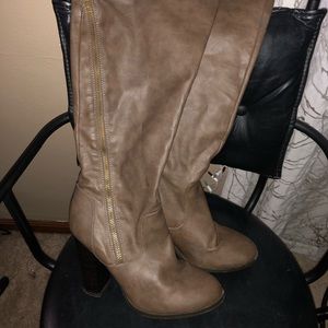 Heeled knee high boots